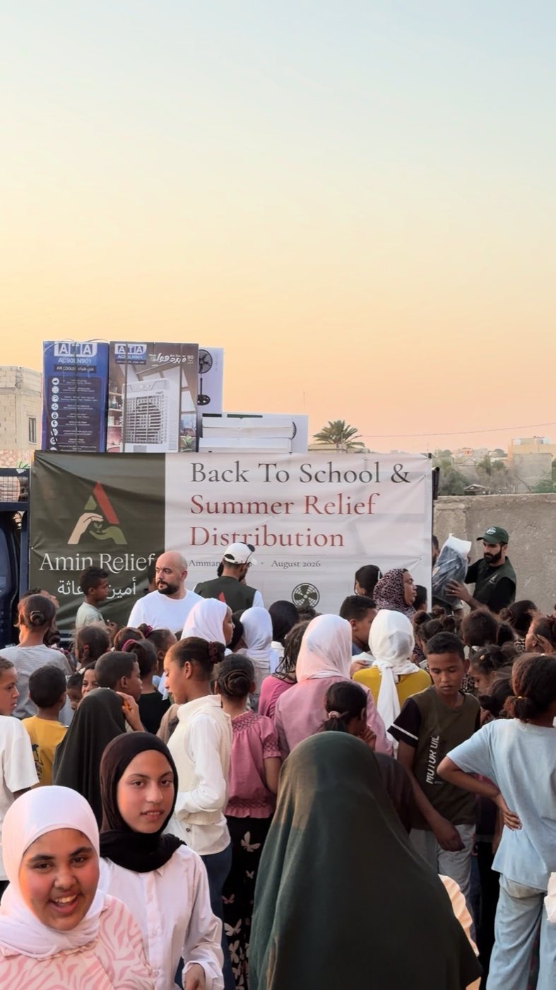 Families gathered at the Back To School and Summer Relief distribution in Amman